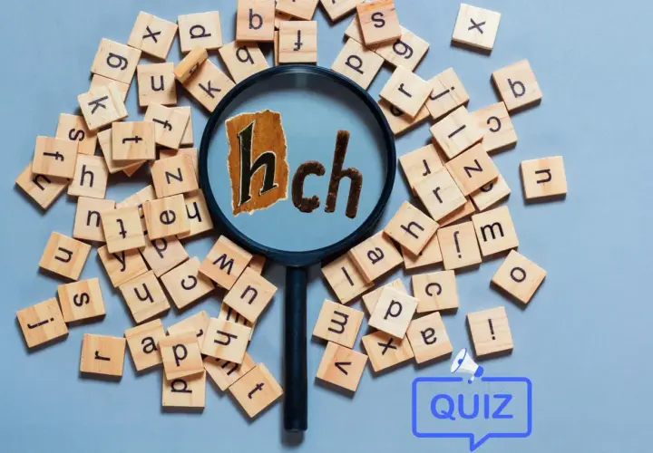 Litery na drewnianych klockach tworzą chałas, ale pod lupą widać słowo "hch". Quiz!